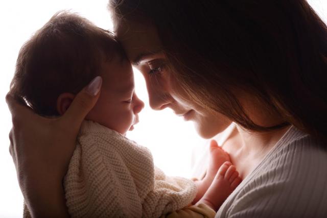 Newborn baby with mother photo shoot in Berlin